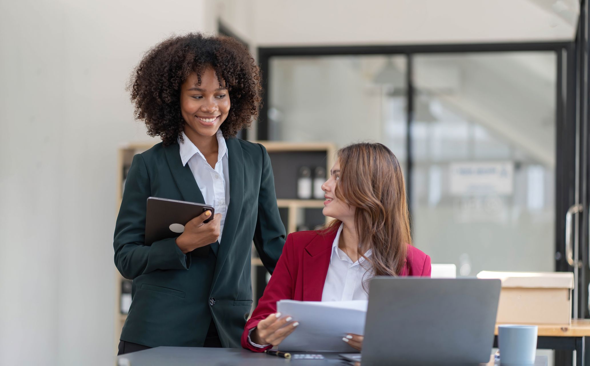 businesswomen-working-together-in-an-urban-workplace