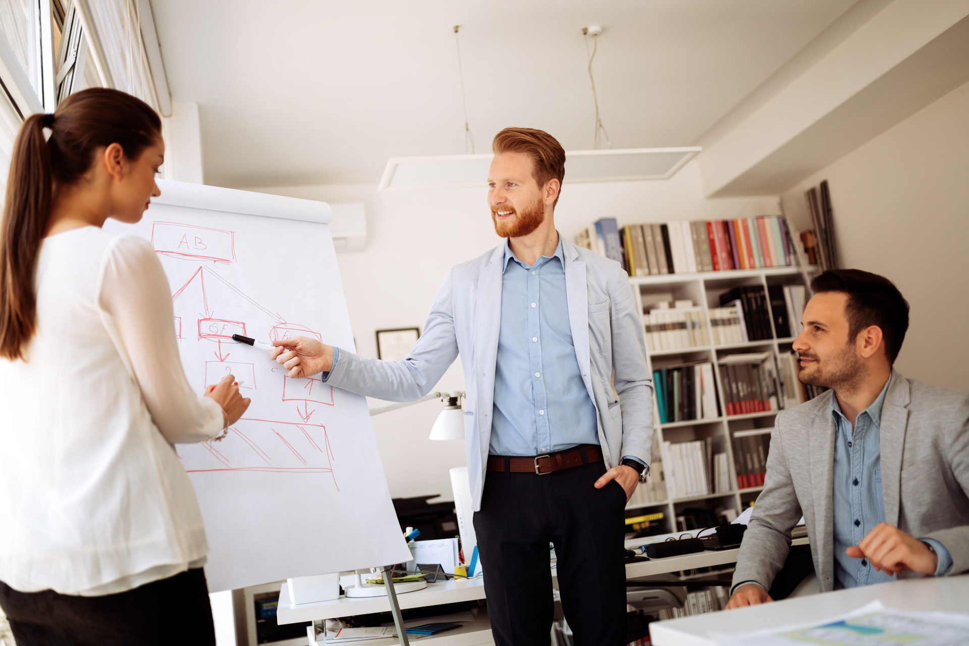group-of-business-people-working-as-team-in-office-training